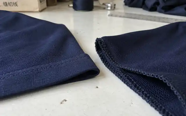 Inside seams of two turned-out navy jersey garment pieces