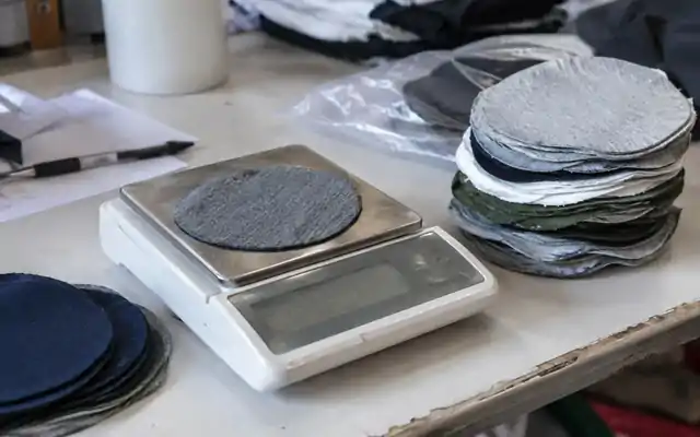Circular jersey sample on a small tabletop scale