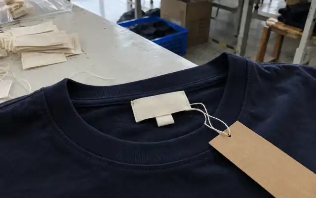Plain woven labels, garment neckline and kraft tag