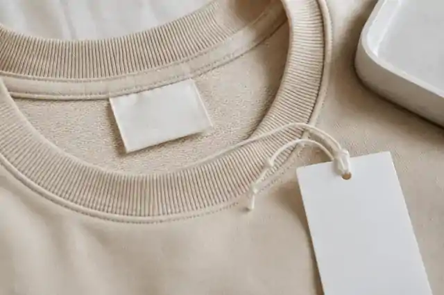 Blank woven neck label, hangtag and trims for a private-label garment