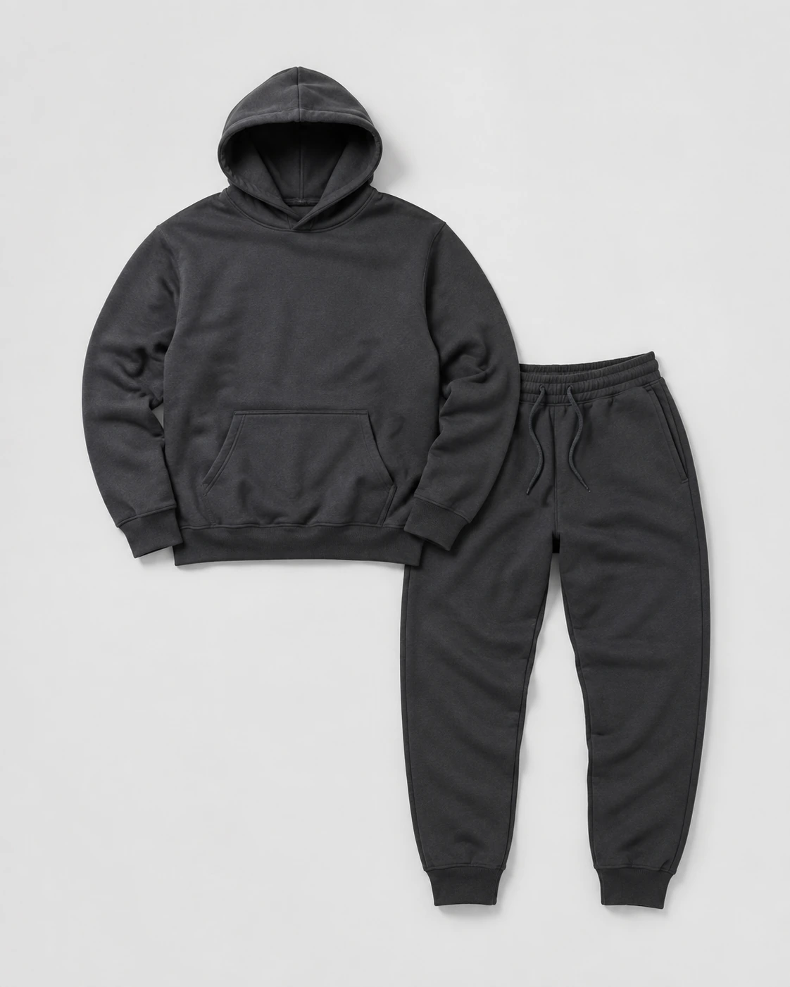 Charcoal hoodie sets on a neutral studio background