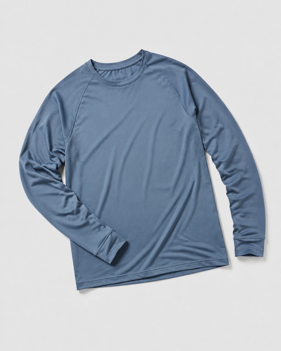 Technical long-sleeve crewneck training top with raglan sleeves and natural fabric folds