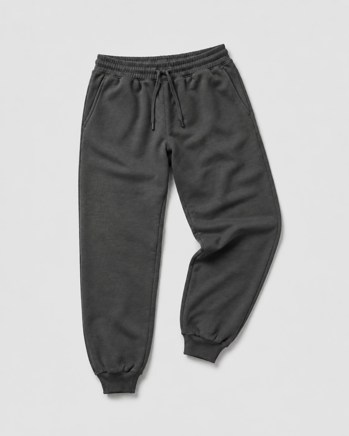 Fleece jogger sweatpants with a drawstring waistband, side pockets and elastic cuffs